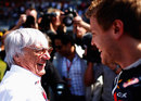 Bernie Ecclestone shares a joke with Sebastian Vettel
