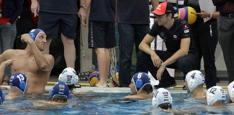 Jenson Button gets close to the action as the Hungarian national waterpolo team train
