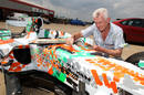 Artist Dexter Brown paints a VJM01-05 chassis for charity