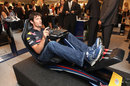 Mark Webber keeps practising the Silverstone track while at the launch of a Red Bull racing shoe at Harrods