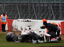 Kamui Kobayashi crashes heavily on the outside of the final corner