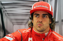 Fernando Alonso in the back of the Ferrari garage