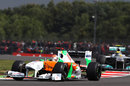Adrian Sutil heads Nico Rosberg