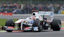 Kamui Kobayashi hurtles through a qualifying lap