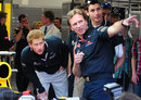 Prince Harry  speaks with Red Bull team principal Christian Horner 