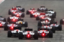 A full grid of 24 Formula One heads for the first corner
