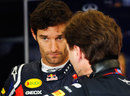 Mark Webber talks with Christian Horner in the Red Bull garage