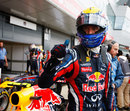 Mark Webber gets out of his car in parc ferme
