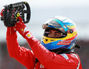 Fernando Alonso celebrates victory at Silverstone