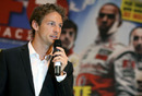 Jenson Button talks to the crowds at the NEC