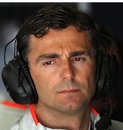 McLaren's third driver Pedro De la Rosa keeps an eye on the action