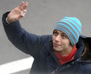 Valentino Rossi waves to fans at Barcelona