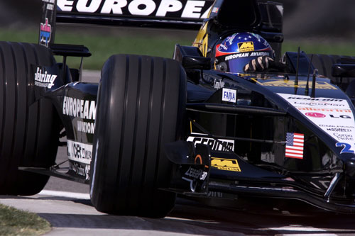 Fernando Alonso pushes his Minardi to the limit