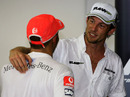 Lewis Hamiton congratulates Jenson Button on his title