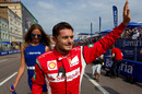 Giancarlo Fisichella waves to fans at the 'Moscow City Racing' show