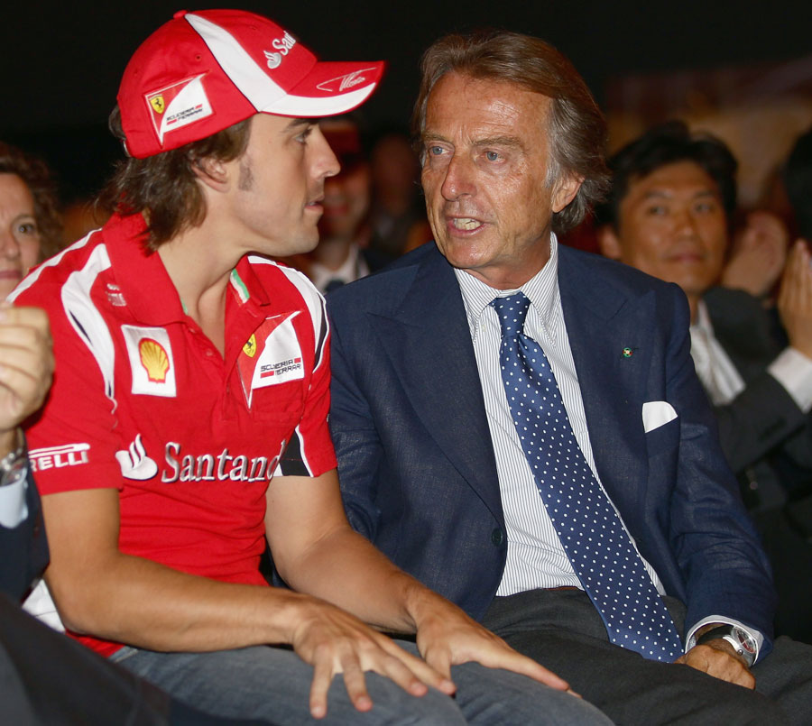 Fernando Alonso and Luca di Montezemolo chat during the Ferrari World Design Contest at the team's factory in Maranello