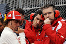 Fernando Alonso, his race engineer Andrea Stella and Ferrari technical director Pat Fry on the grid