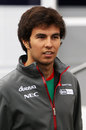 Sergio Perez in a wet paddock on Thursday morning