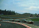 Niki Lauda leads a pack of cars during a celebrity race at the Nurburgring