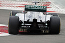Michael Schumacher puts some heat in his rear tyres