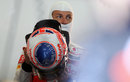 Jenson Button prepares for a free practice session