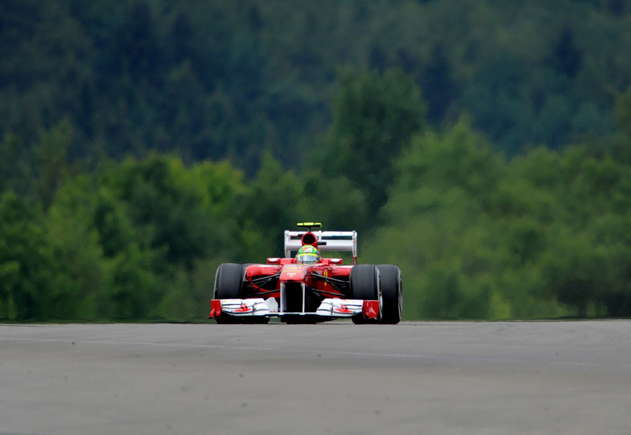 Felipe Massa crests part of the undulating circuit