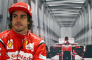 Fernando Alonso waits patiently in the Ferrari garage