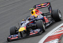 Mark Webber aims for an apex on his way to pole position