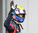 Mark Webber waves to the crowd after taking pole
