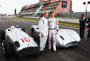 David Coulthard and Mika Hakkinen prepare to demonstrate some classic Mercedes grand prix cars ahead of the race
