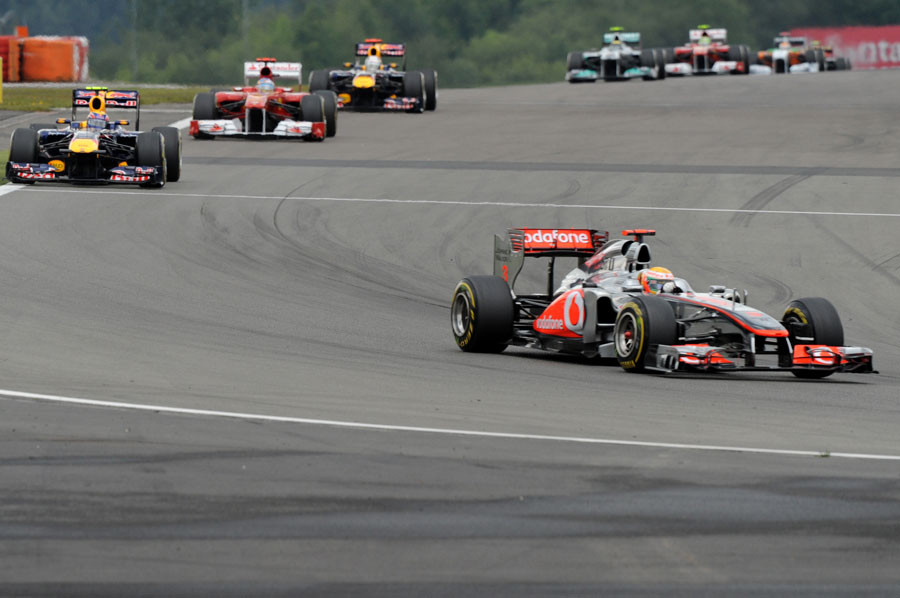 Lewis Hamilton leads early in the race