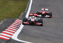 Lewis Hamilton heads Fernando Alonso