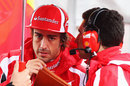 Fernando Alonso talks to his race engineer Andrea Stella before the race