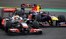 Lewis Hamilton keeps Mark Webber at bay in turn one