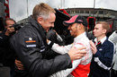 Lewis Hamilton celebrates his victory with Martin Whitmarsh