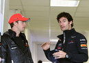 Mark Webber and Jenson Button chat before the press conference