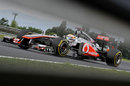 Lewis Hamilton attacks the circuit in his McLaren