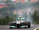 Nico Rosberg gets off the brakes after locking a tyre