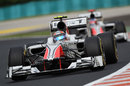 Tonio Liuzzi leads team-mate Daniel Ricciardo on track