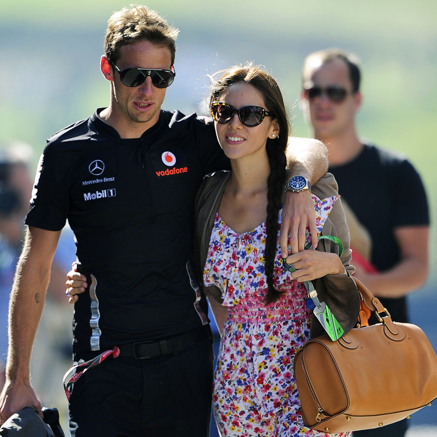 Jenson Button and girlfriend Jessica Michibata arrive on Saturday morning