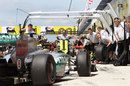 Nico Rosberg visits his pits for a tyre change