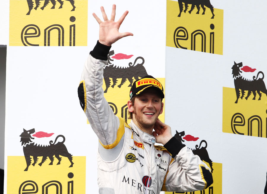 Romain Grosjean celebrates his fifth victory of the season