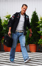 Michael Schumacher arrives in the paddock 