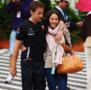 Jenson Button and girlfriend Jessica Michibata arrive in the paddock on Sunday morning