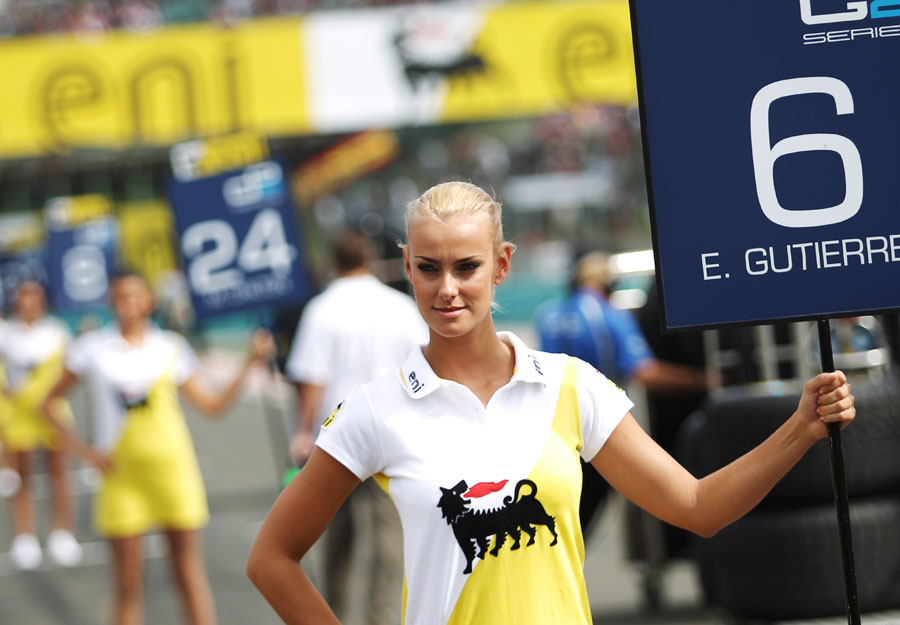 Grid girls line up for the GP2 feature race