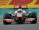 Jenson Button holds a huge slide in the McLaren