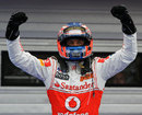 Jenson Button celebrates at the end of his race