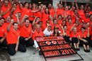 The McLaren team celebrate Jenson Button's victory
