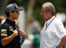 Daniel Ricciardo talks to Helmut Marko in the paddock
