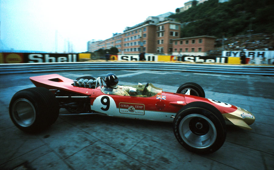 Graham Hill on his way to victory in the new Lotus 49D
